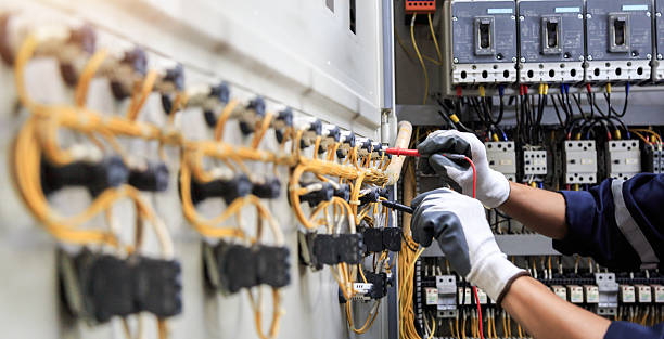 Professional Electrician technician working in Lake City, IA